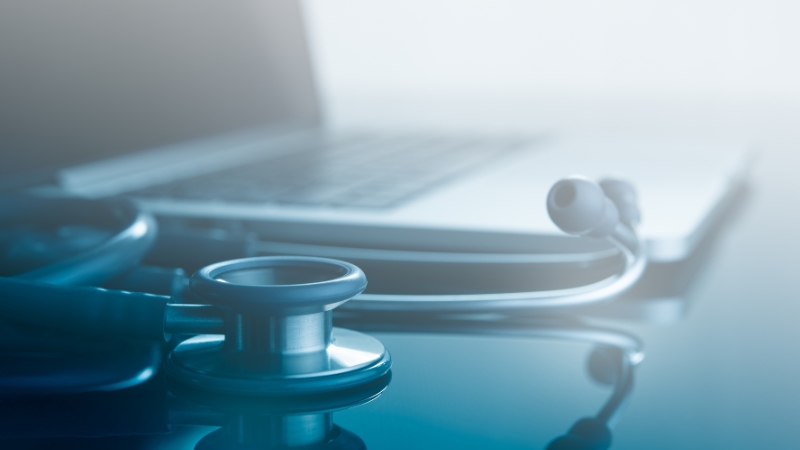 Stethoscope and laptop on a desk representing medical cases related to misdiagnosis lawsuits