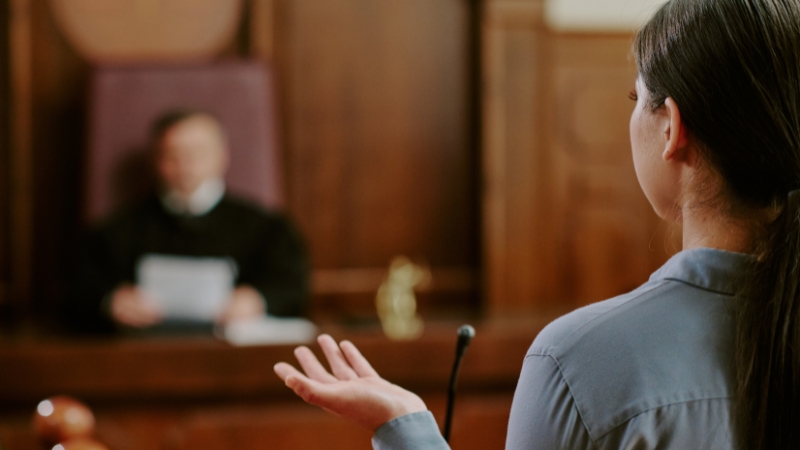 Driver speaking in court during a hearing to fight a speeding ticket